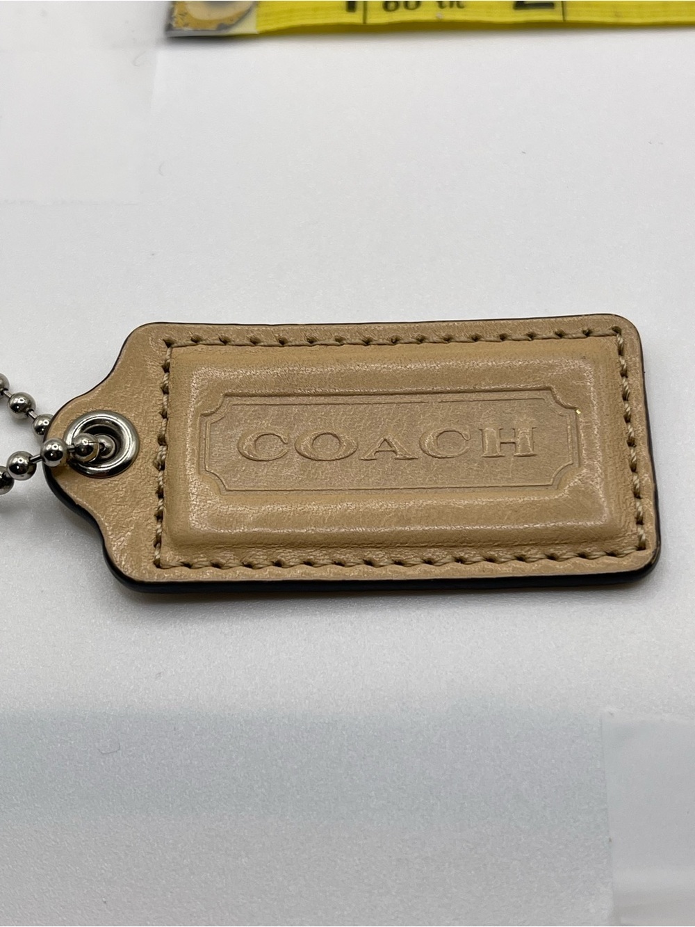 COACH Leather Hang Tag - Beige